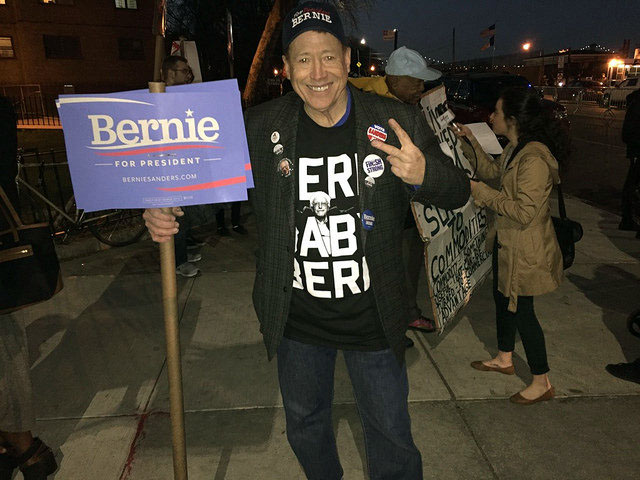  Kyle Cranston, of South Hampton in Long Island, New York, was decked out in Sanders attire outside of the debate venue. by Leann Garofolo 