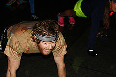 The Rise co-leader Joseph Mullins having some fun in the rain while holding his plank. Photo Credit: Ben Shapiro