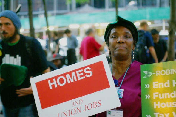 Wensum Pendergrass, a hospital worker, driven to rally in Zuccotti Park by her desire for less expensive rent. She is a mother and her daughter lives with her. She is certain that if she loses her job she will become homeless. Photo by Diego Lynch