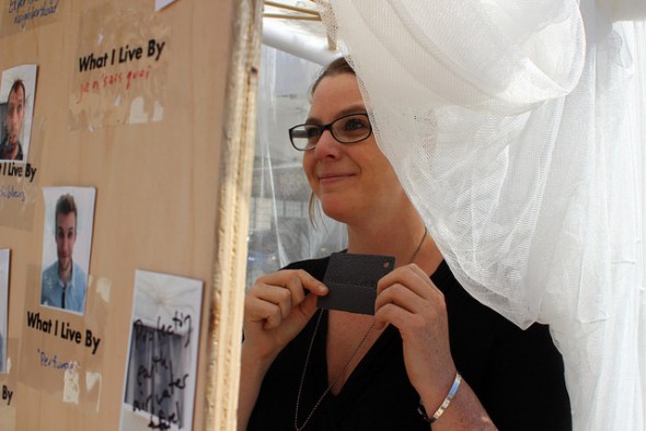 Elizabeth Seldin poses with her WhatILiveBy leather tag, a symbol of her commitment to finding value in herself. Seldin said she lives by creativity and love. Photo Credit: Elizabeth Arakelian