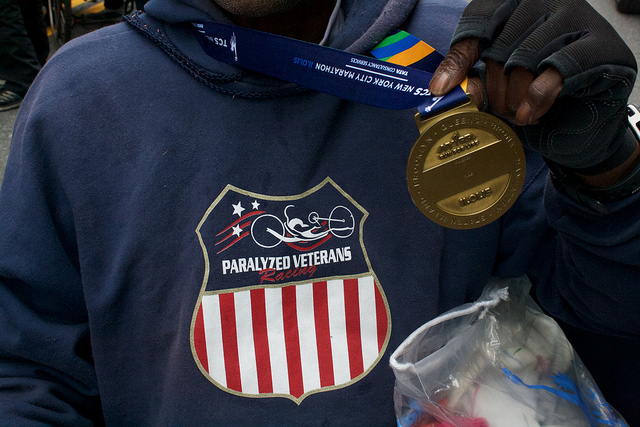 James Johnson's finisher medal along with his sweatshirt sporting the Paralyzed Veterans emblem. Photo by Leann Garofolo